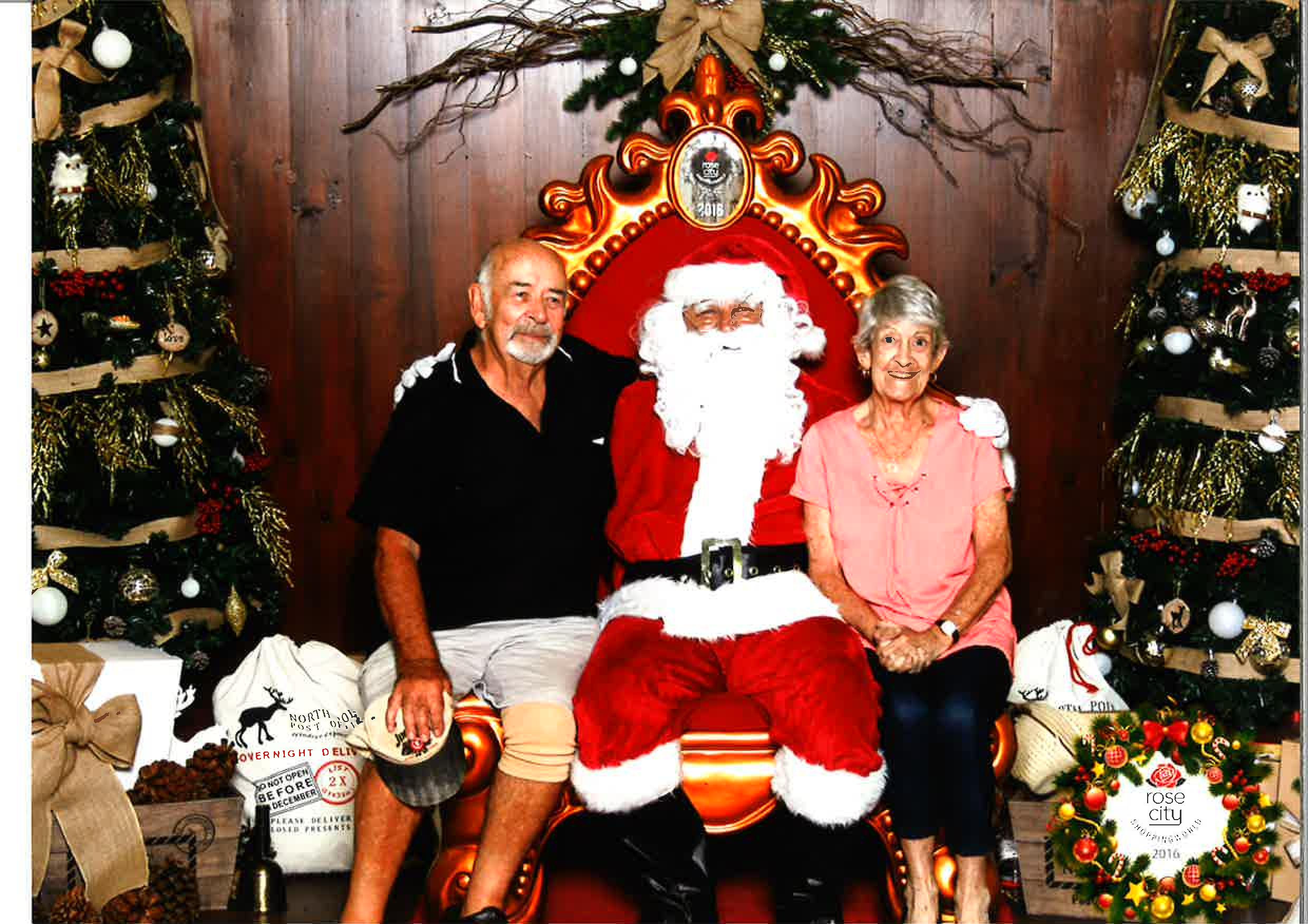Dennis and Rosalie Halcrow with Santa. Dennis and Rosalie Halcrow with Santa.
