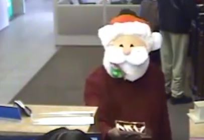 WATCH: Santa gives out candy canes in bank... then robs it