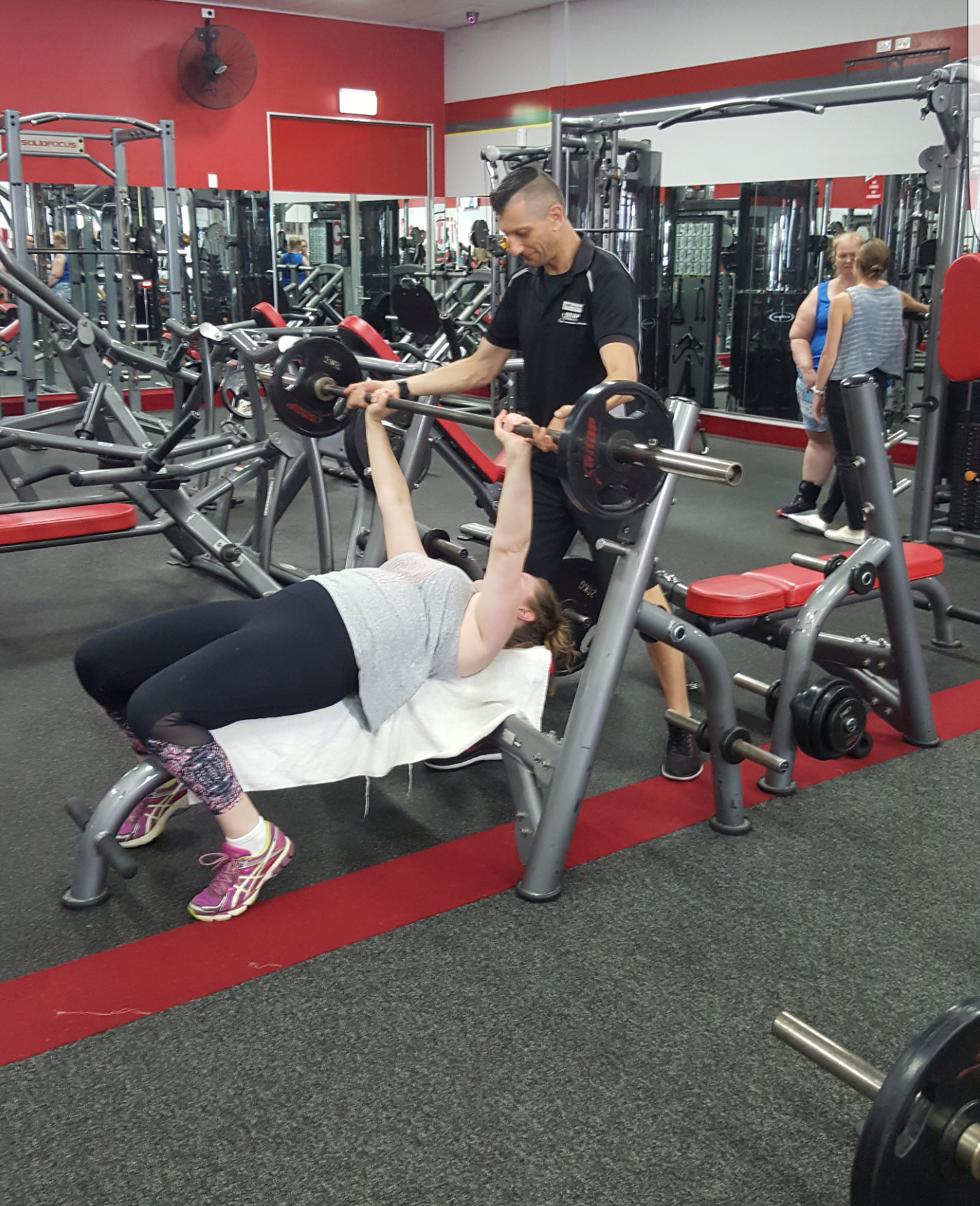 Personal trainer Lawrence Lubke, pictured training a client at Snap Fitness Yamanto, offers his advice on how to stick to New Year's resolutions. Personal trainer Lawrence Lubke, pictured training a client at Snap Fitness Yamanto, offers his advice on how to stick to New Year's resolutions.