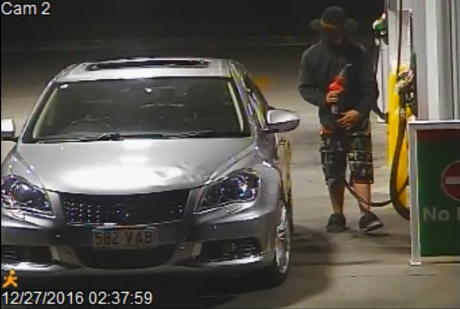 Police say they believe the person apparently stealing fuel in in this CCTV footage, taken at Kybong, is the same person who later tried to rob a service station at Pomona. Police say they believe the person apparently stealing fuel in in this CCTV footage, taken at Kybong, is the same person who later tried to rob a service station at Pomona.