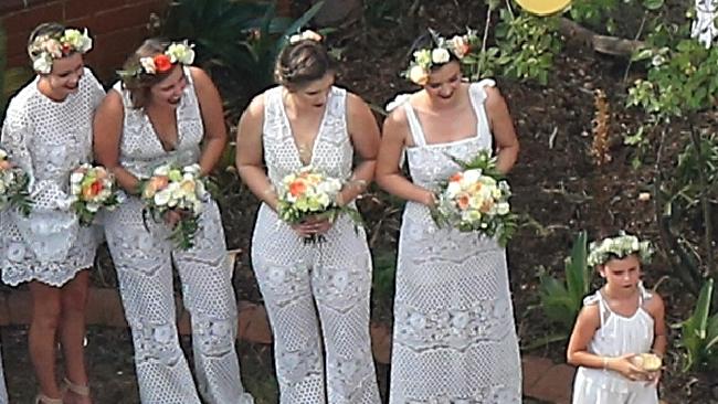 Supermodel Miranda Kerr (right) leads the floral-themed ladies at her brother’s wedding. Supermodel Miranda Kerr (right) leads the floral-themed ladies at her brother’s wedding.