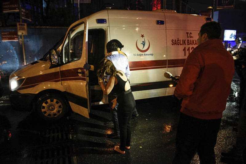 People talk to medics in an ambulance near the scene of an attack in Istanbul. People talk to medics in an ambulance near the scene of an attack in Istanbul.