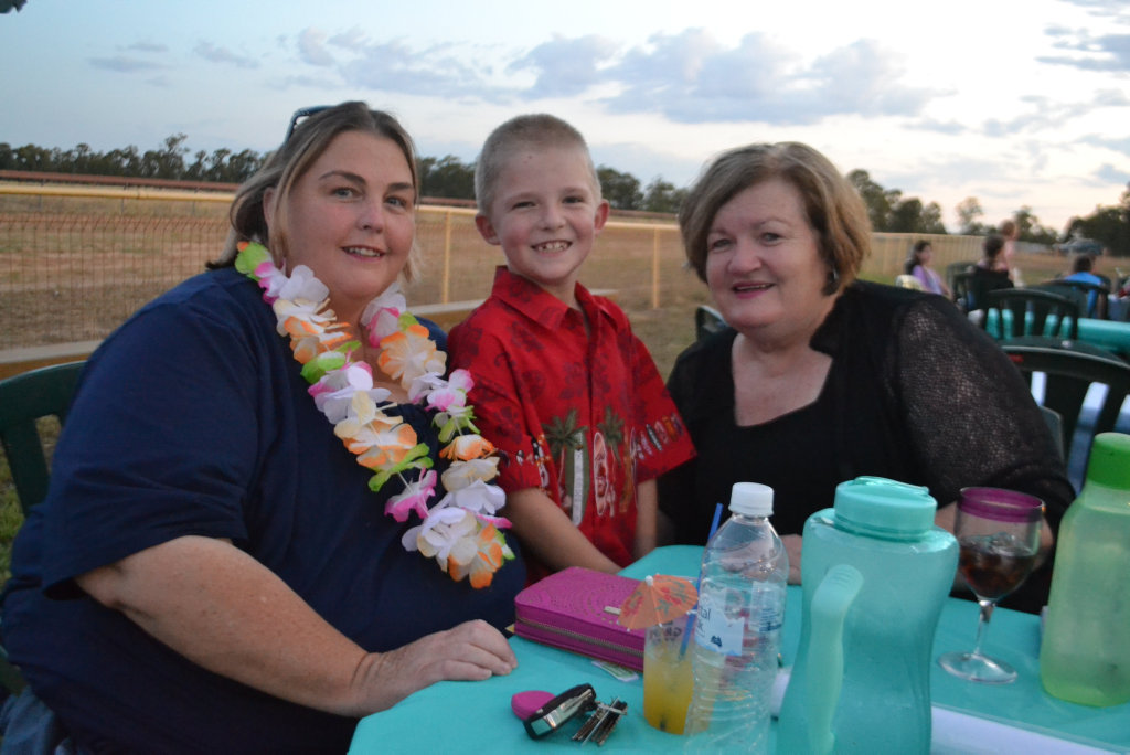 Image for sale: Kaye and Tom Coleman with Wendy Carroll at the Miles New Years Eve beach party celebrations. 31/12/16.