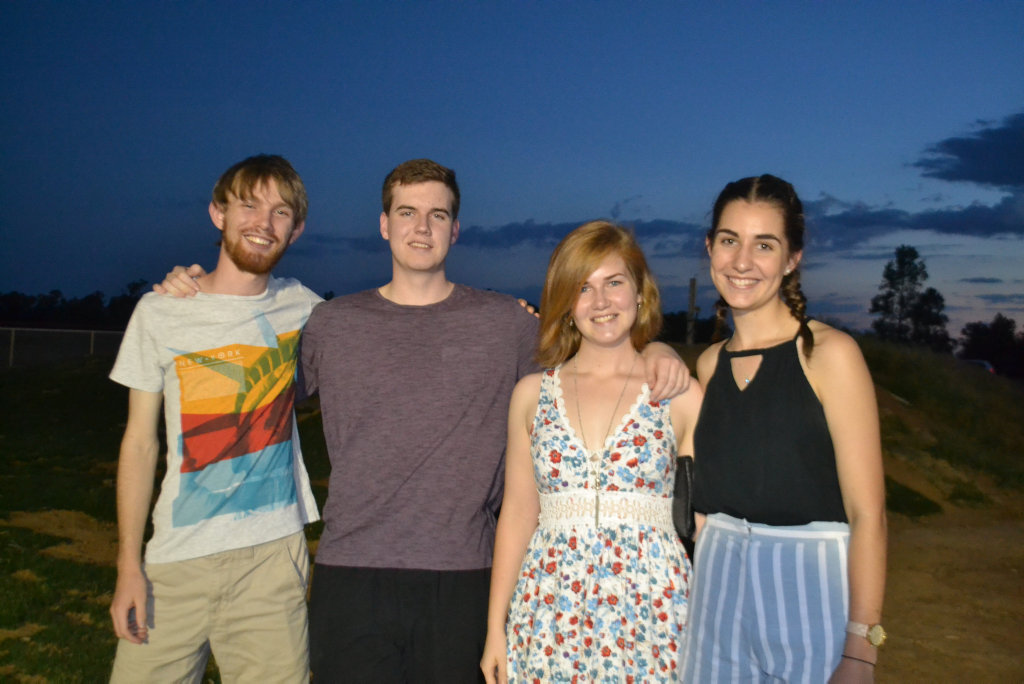 Image for sale: Josh Luebbe, Isaac Allwood, Rhianna Allwood and Angela Krause at the Miles New Years Eve beach party celebrations. 31/12/16.