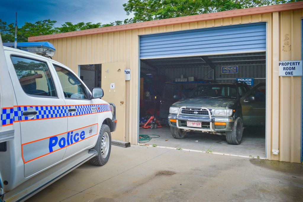 INVESTIGATION: Police are combing over a Nissan Pathfinder for evidence. INVESTIGATION: Police are combing over a Nissan Pathfinder for evidence.
