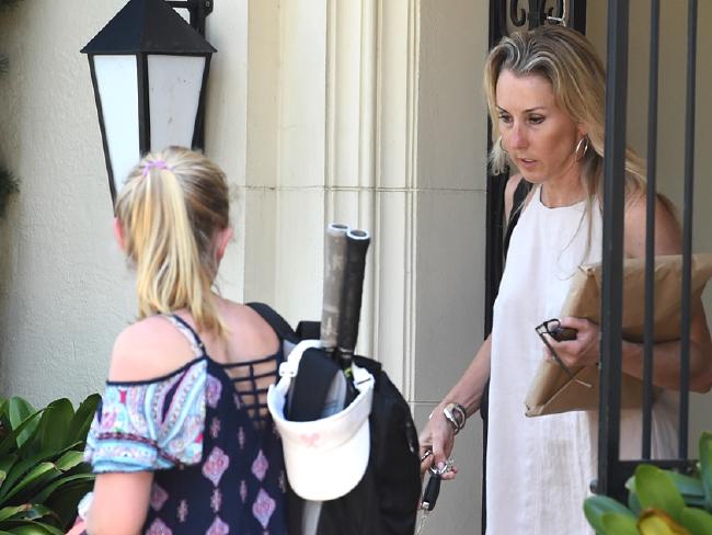Tania Hird leaves the family Toorak home with her children while James Hird is recovering at a facility after a suspected drug overdose. Tania Hird leaves the family Toorak home with her children while James Hird is recovering at a facility after a suspected drug overdose.
