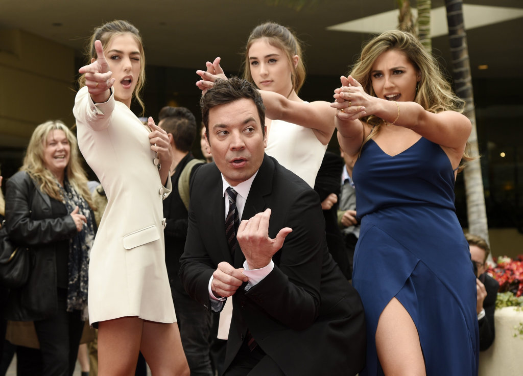 Jimmy Fallon, host of the 74th Annual Golden Globe Awards, poses with Miss Golden Globes 2017, from left, sisters Sistine, Scarlet and Sophia Stallone after rolling out the red carpet during Golden Globe Awards Preview Day at the Beverly Hilton on Wednesday, Jan. 4, 2017, in Beverly Hills, Calif. Jimmy Fallon, host of the 74th Annual Golden Globe Awards, poses with Miss Golden Globes 2017, from left, sisters Sistine, Scarlet and Sophia Stallone after rolling out the red carpet during Golden Globe Awards Preview Day at the Beverly Hilton on Wednesday, Jan. 4, 2017, in Beverly Hills, Calif.