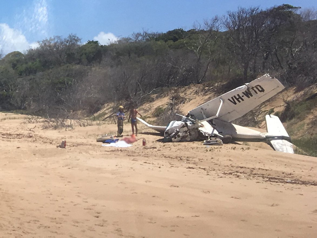 WRECKAGE: One person has died and three hospitalised after a light plane crashed at Bustard Head, north of Middle Island.Photo Courtesy RACQ LifeFlight RescuePhoto Contributed WRECKAGE: One person has died and three hospitalised after a light plane crashed at Bustard Head, north of Middle Island.Photo Courtesy RACQ LifeFlight RescuePhoto Contributed