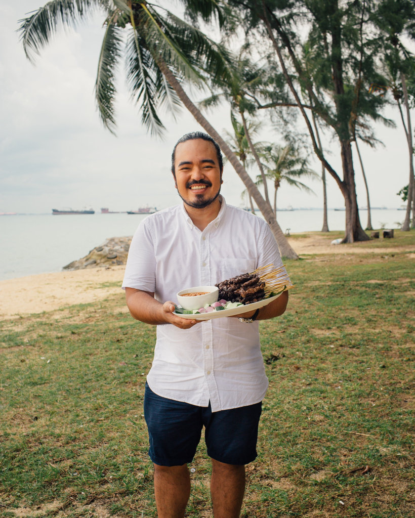 Adam Liaw with his beef satay in a scene from Destination Flavour Singapore. Adam Liaw with his beef satay in a scene from Destination Flavour Singapore.