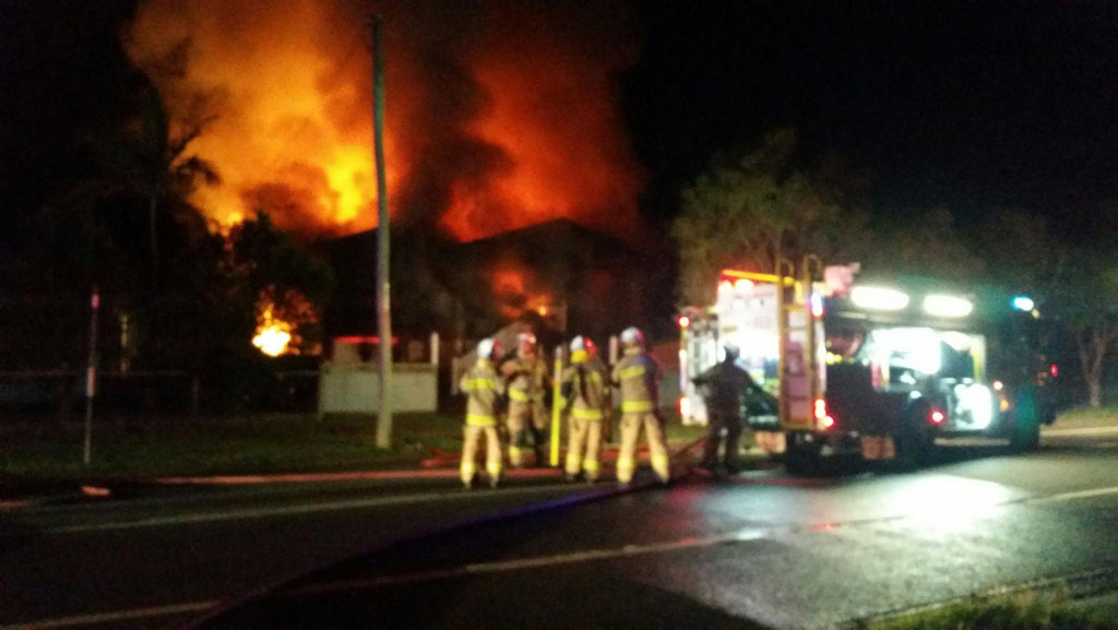 Fire crews work to put out the blaze which engulfed a Queenslander in Granville. Fire crews work to put out the blaze which engulfed a Queenslander in Granville.