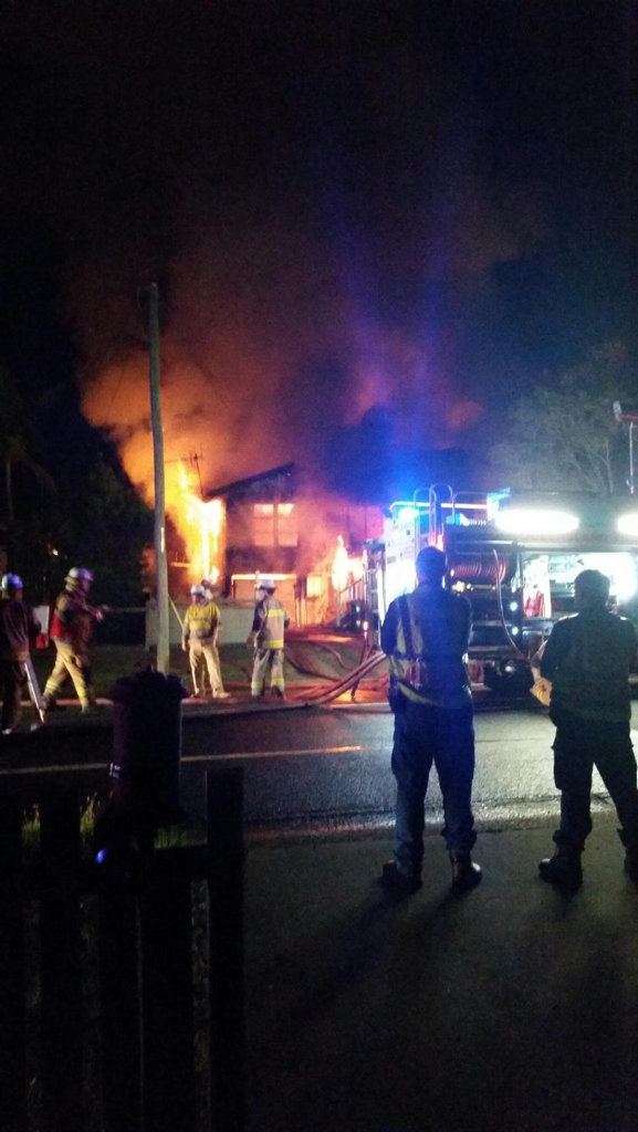 Fire crews work to put out the blaze which engulfed a Queenslander in Granville. Fire crews work to put out the blaze which engulfed a Queenslander in Granville.