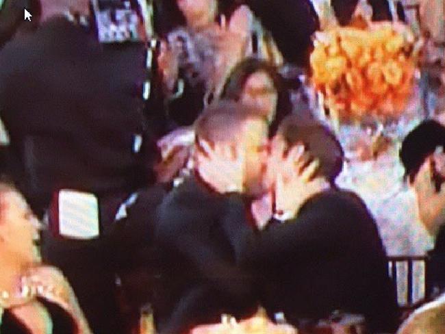 Ryan Reynolds and Andrew Garfield kiss at the Golden Globes had tongues wagging. Ryan Reynolds and Andrew Garfield kiss at the Golden Globes had tongues wagging.