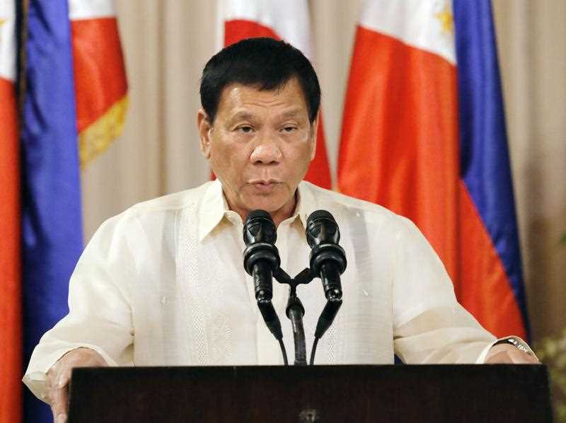 Philippine President Rodrigo Duterte speaks at a joint news conference with Japanese Prime Minister Shinzo Abe following their talks at the Malacanang Palace in Manila on Jan. 12, 2017. Philippine President Rodrigo Duterte speaks at a joint news conference with Japanese Prime Minister Shinzo Abe following their talks at the Malacanang Palace in Manila on Jan. 12, 2017.