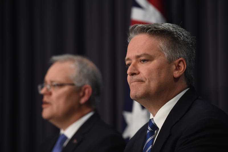 Australia's Treasurer Scott Morrison and Australia's Finance Minister Mathias Cormann speak to the media during a press conference. Australia's Treasurer Scott Morrison and Australia's Finance Minister Mathias Cormann speak to the media during a press conference.