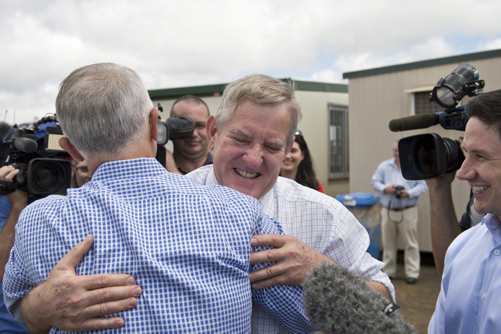 NO BAD BLOOD: Prime Minister Malcolm Turnbull and ex-Groom MP Ian Macfarlane share an embrace in Toowoomba. NO BAD BLOOD: Prime Minister Malcolm Turnbull and ex-Groom MP Ian Macfarlane share an embrace in Toowoomba.