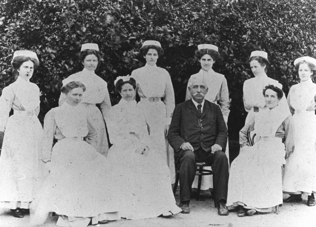Dr May and nursing staff of Bundaberg Hospital in 1911. Bundaberg Base Hospital complex was opened by the Governor of Queensland, Sir William McGregor on July 9, 1914. The original hospital erected on the site during 1880-81, was little more than a four-room cottage with kitchen and a separate ward for Kanakas. Hospital is located in Bourbong Street, West. Buildings shown have been demolished during major redevelopment in 2009. Dr May and nursing staff of Bundaberg Hospital in 1911. Bundaberg Base Hospital complex was opened by the Governor of Queensland, Sir William McGregor on July 9, 1914. The original hospital erected on the site during 1880-81, was little more than a four-room cottage with kitchen and a separate ward for Kanakas. Hospital is located in Bourbong Street, West. Buildings shown have been demolished during major redevelopment in 2009.