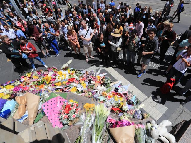 Mourners show up in their dozens to pay their respects. Mourners show up in their dozens to pay their respects.