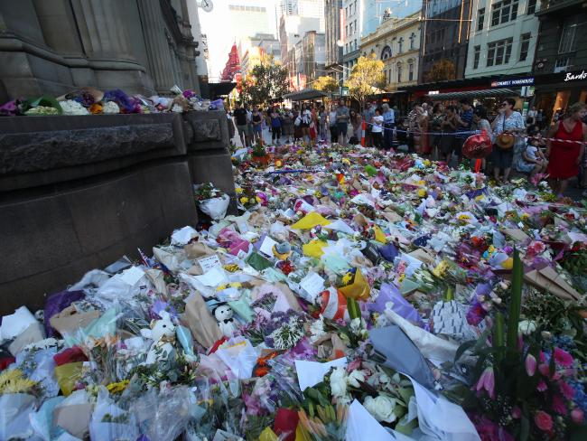 A flower memorial in Bourke St on Sunday evening. A flower memorial in Bourke St on Sunday evening.