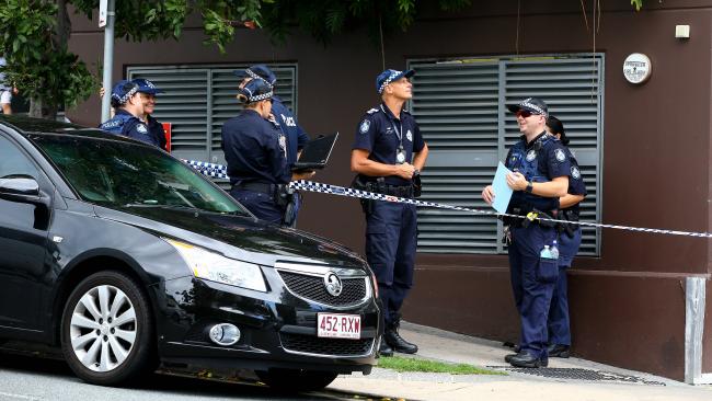 Forensic crime scene police at Surfers Paradise following a shooting. Forensic crime scene police at Surfers Paradise following a shooting.