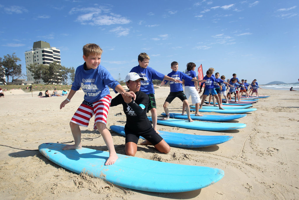 Learning to surf means taking baby steps at first. Learning to surf means taking baby steps at first.