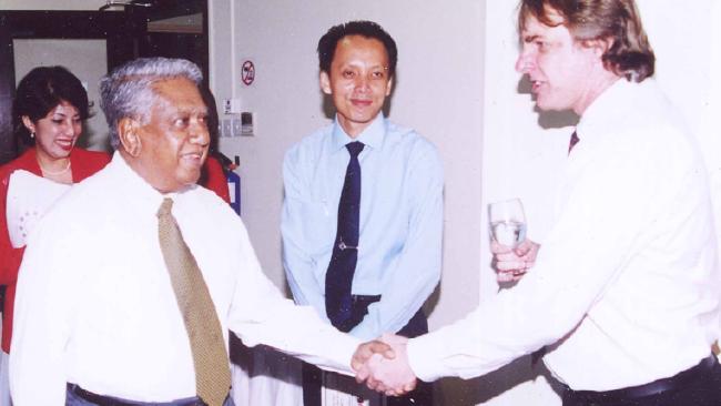 Dr John Tholen, right, with former Singaporean President S. R. Nathan Dr John Tholen, right, with former Singaporean President S. R. Nathan