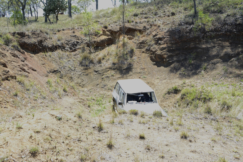 DAM: The damaged vehicle left in an abandoned quarry in Torrington after a run from the law. Police are hunting the driver of the vehicle who ran a red light, triggering a night of chaos on the property. Jan 2017 DAM: The damaged vehicle left in an abandoned quarry in Torrington after a run from the law. Police are hunting the driver of the vehicle who ran a red light, triggering a night of chaos on the property. Jan 2017