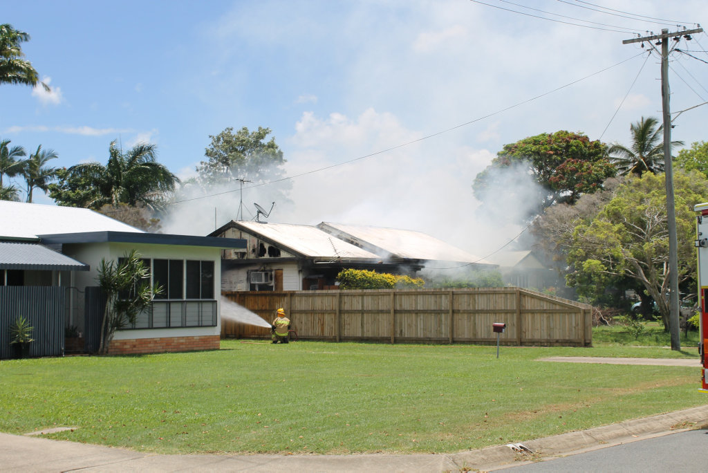 When firefighters at the scene of a house fire on Johnson St, West Mackay, the home was already completely ablaze, with a damaged side and front. When firefighters at the scene of a house fire on Johnson St, West Mackay, the home was already completely ablaze, with a damaged side and front.