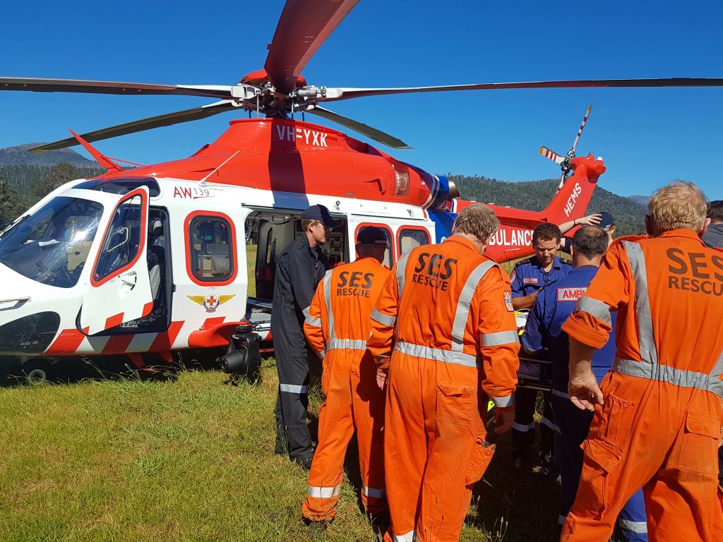 Josh is transferred into the waiting helicopter. Josh is transferred into the waiting helicopter.