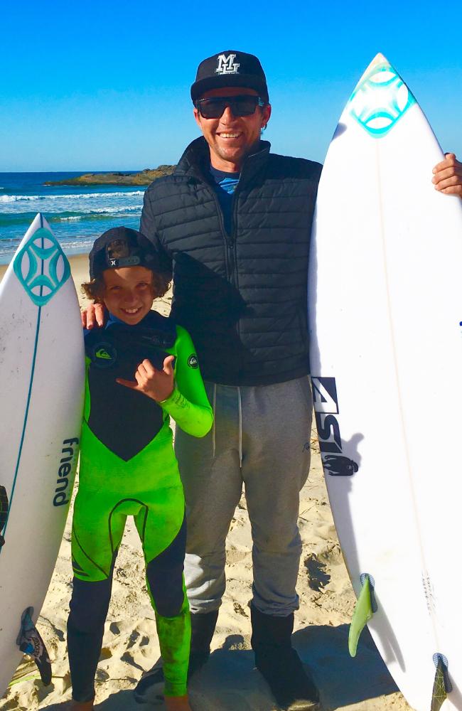 Eden Hasson, pictured with dad Chris, said the close encounter hasn’t put either of them off surfing. Eden Hasson, pictured with dad Chris, said the close encounter hasn’t put either of them off surfing.