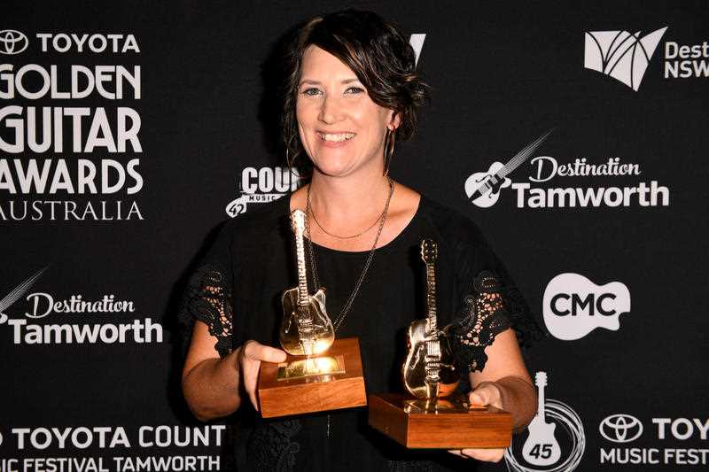 Sara Storer poses for a photograph after receiving the Golden Guitar Awards for Female Artist of the Year and Bush Ballad of the Year during the 45th Tamworth Country Music Festival, in Tamworth, Saturday, Jan. 28, 2017. The Golden Guitar Awards celebrate the best in Australian country music. Sara Storer poses for a photograph after receiving the Golden Guitar Awards for Female Artist of the Year and Bush Ballad of the Year during the 45th Tamworth Country Music Festival, in Tamworth, Saturday, Jan. 28, 2017. The Golden Guitar Awards celebrate the best in Australian country music.