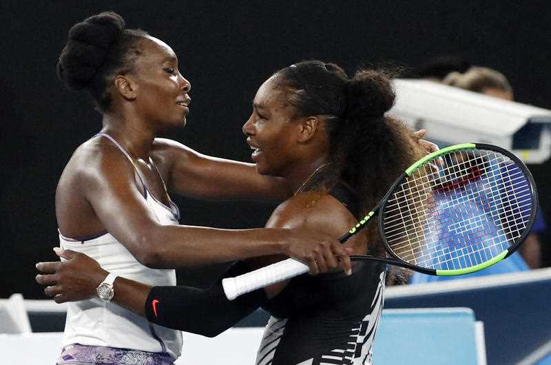 United States' Serena Williams, right, and her sister Venus, left, embrace after Serena won the women's singles final at the Australian Open tennis championships in Melbourne, Australia, Saturday, Jan. 28, 2017. United States' Serena Williams, right, and her sister Venus, left, embrace after Serena won the women's singles final at the Australian Open tennis championships in Melbourne, Australia, Saturday, Jan. 28, 2017.