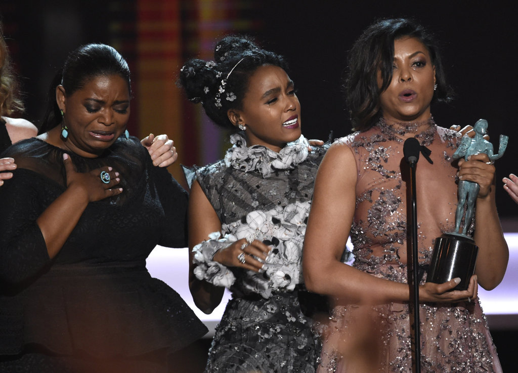 Octavia Spencer, from left, Janelle Monae, and Taraji P. Henson accept the award for outstanding performance by a cast in a motion picture for \ Octavia Spencer, from left, Janelle Monae, and Taraji P. Henson accept the award for outstanding performance by a cast in a motion picture for \