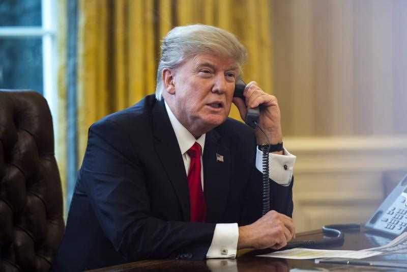 US President Donald J. Trump speaks on the phone with the King of Saudi Arabia, Salman bin Abd al-Aziz Al Saud, in the Oval Office in Washington, DC, USA, 29 January 2017. US President Donald J. Trump speaks on the phone with the King of Saudi Arabia, Salman bin Abd al-Aziz Al Saud, in the Oval Office in Washington, DC, USA, 29 January 2017.
