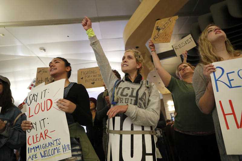 People opposed to President Donald Trump's executive order banning travel from seven Muslim-majority countries continue to demonstrate at Los Angeles International Airport Sunday, Jan. 29, 2017. People opposed to President Donald Trump's executive order banning travel from seven Muslim-majority countries continue to demonstrate at Los Angeles International Airport Sunday, Jan. 29, 2017.
