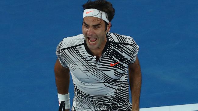 Roger Federer realises he’s just won his 18th major. Roger Federer realises he’s just won his 18th major.