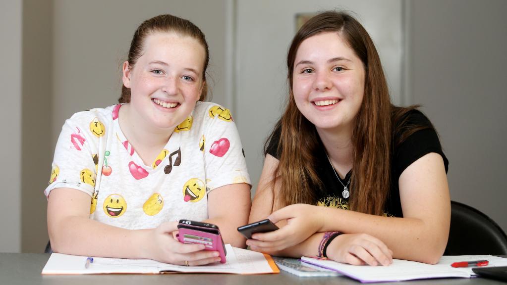 Year 9 students Imogen Crawley and Bethany Lord will be analysing text message chats with emojis instead of literary texts in practice NAPLAN online exams this year.
Year 9 students Imogen Crawley and Bethany Lord will be analysing text message chats with emojis instead of literary texts in practice NAPLAN online exams this year.