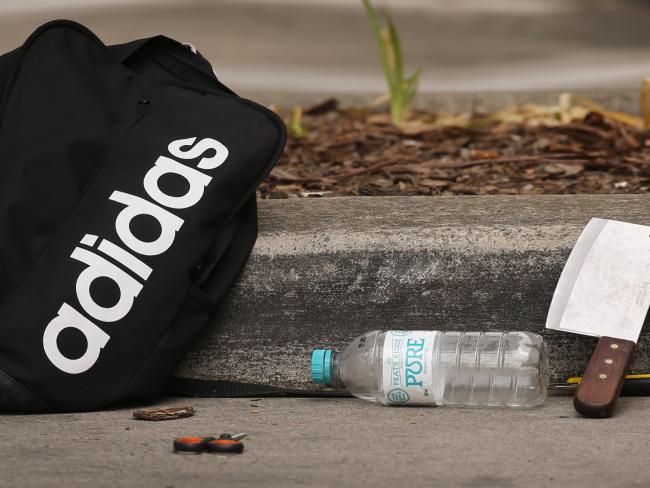 The boy’s bag contained a meat cleaver and knives. The boy’s bag contained a meat cleaver and knives.