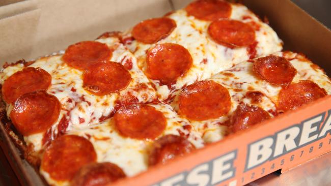 Little Caesars Hot-N-Ready pizza offering means consumers can get their 12-inch pizza in just 30 seconds. Little Caesars Hot-N-Ready pizza offering means consumers can get their 12-inch pizza in just 30 seconds.