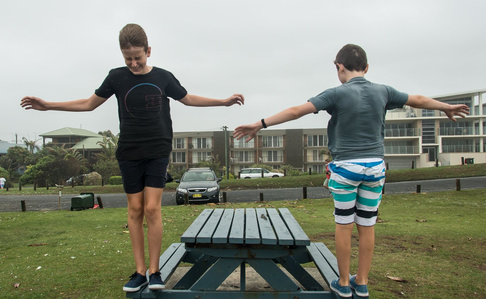 Cabarita Beach, children play in strong winds. Cabarita Beach, children play in strong winds.