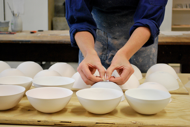 Local potter Claire Atkins at work in her studio. Photo credit : Megan Kinninment Local potter Claire Atkins at work in her studio. Photo credit : Megan Kinninment