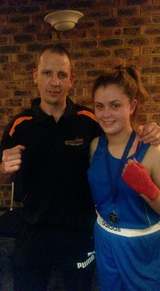 Anna wins novice boxing title. 