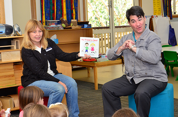 Author James Kerwin presents a live reading of his book My Friend is Deaf with the assistance of Fairholme teacher Sonya Nicol. Photo contributed